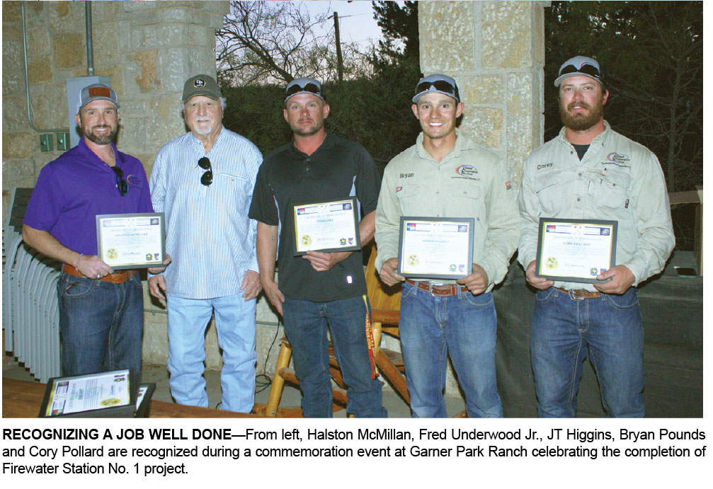 RECOGNIZING A JOB WELL DONE—From left, Halston McMillan, Fred Underwood Jr., JT Higgins, Bryan Pounds and Cory Pollard are recognized during a commemoration event at Garner Park Ranch celebrating the completion of Firewater Station No. 1 project.