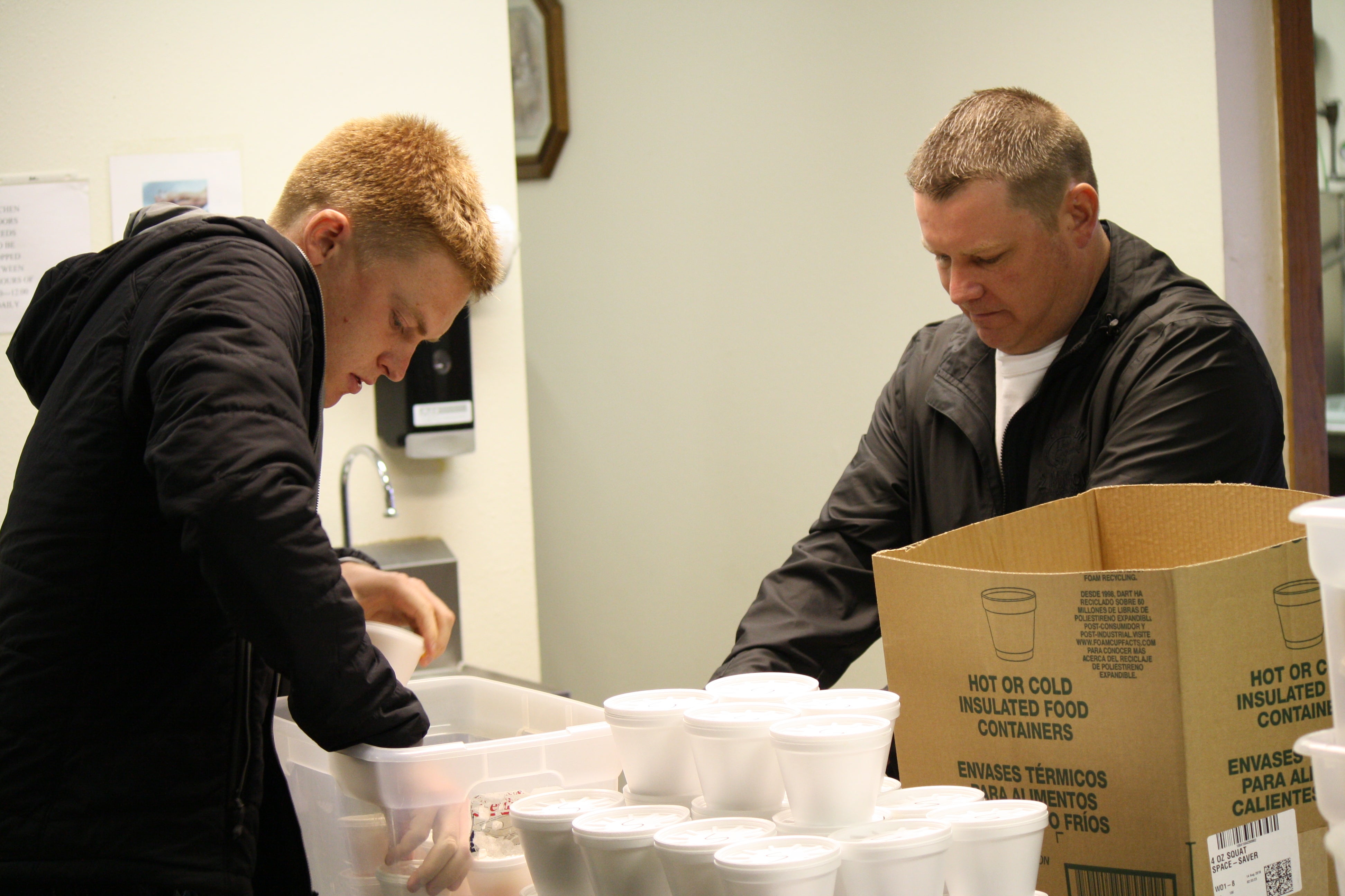Kade Kincannon and Thurman Mauppin pack lunches.