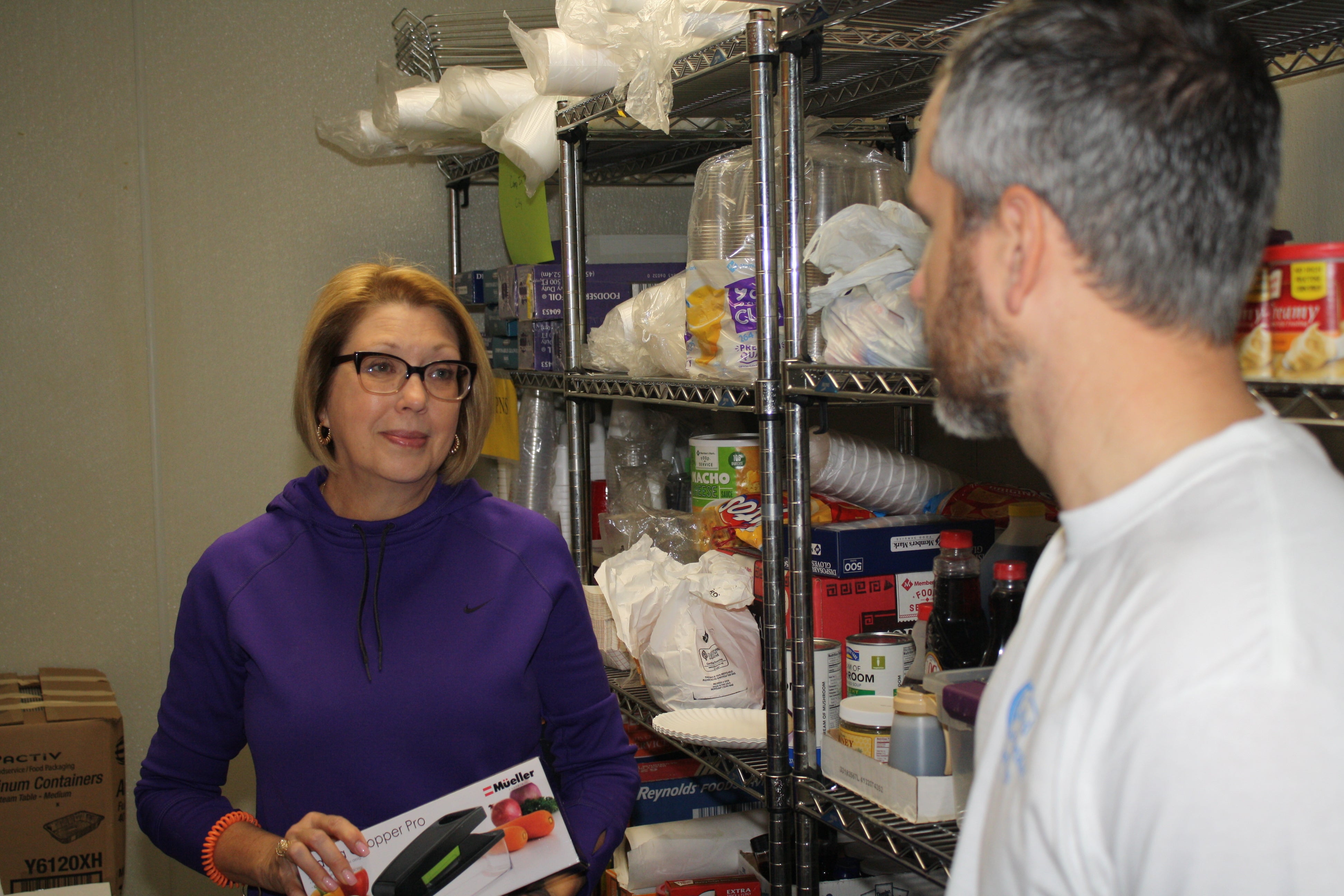 Blake Beavers, right, discusses preparation plans with Kathy Colomo