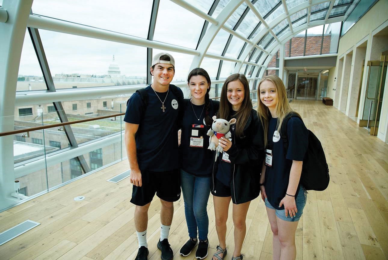 Sydney Aalbers hangs with new friends.