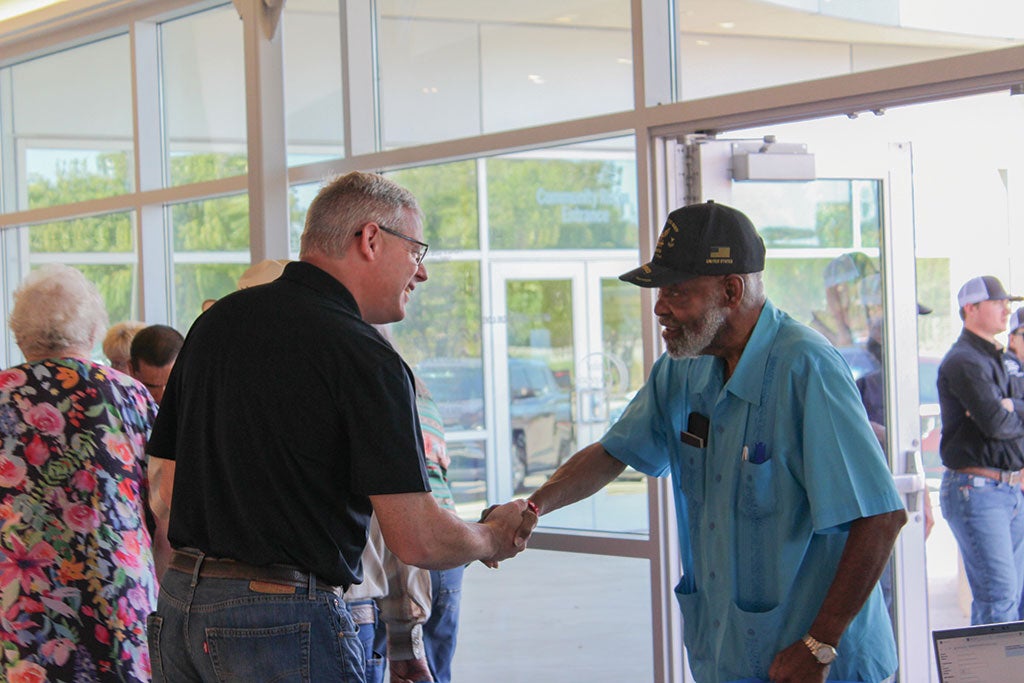 Cameron Smallwood, United's CEO, greets valued member