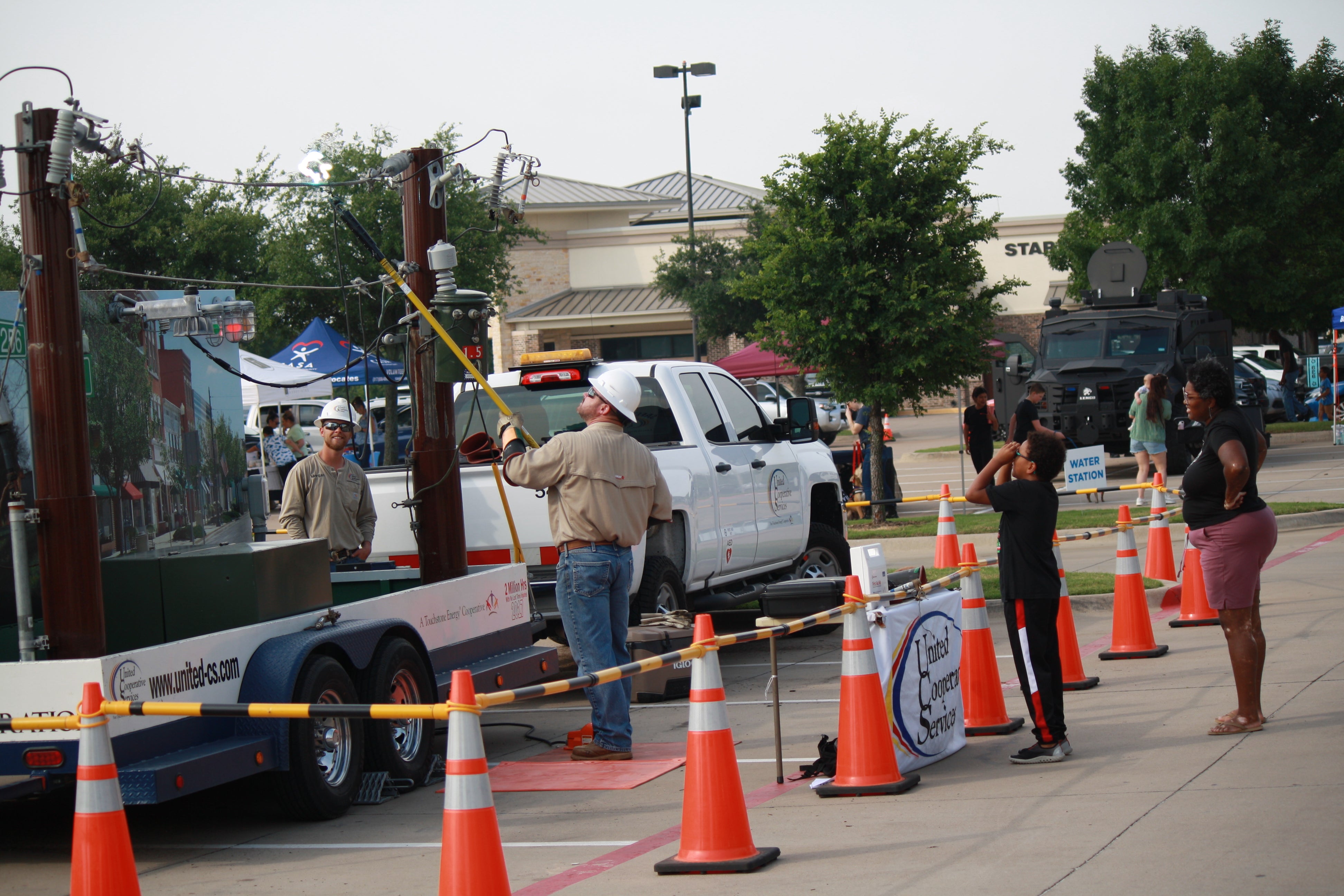 United employee at Safety Saturday showing arcing demo