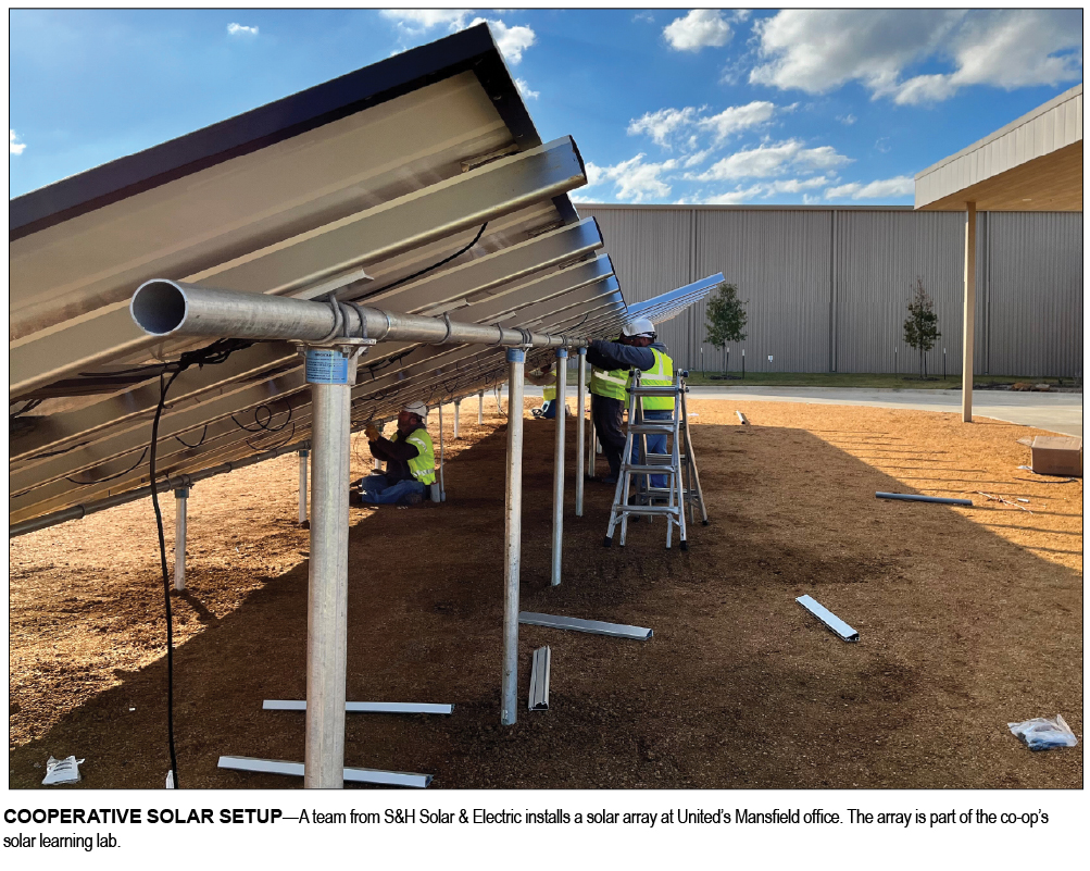 COOPERATIVE SOLAR SETUP—A team from S&H Solar & Electric installs a solar array at United’s Mansfield office. The array is part of the co-op’s solar learning lab.