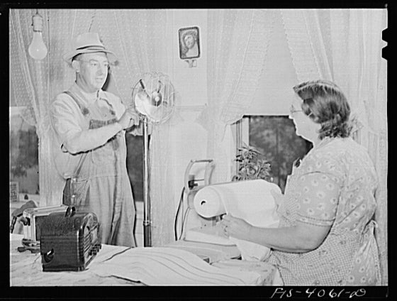 A farm family in the '30s with electricity.