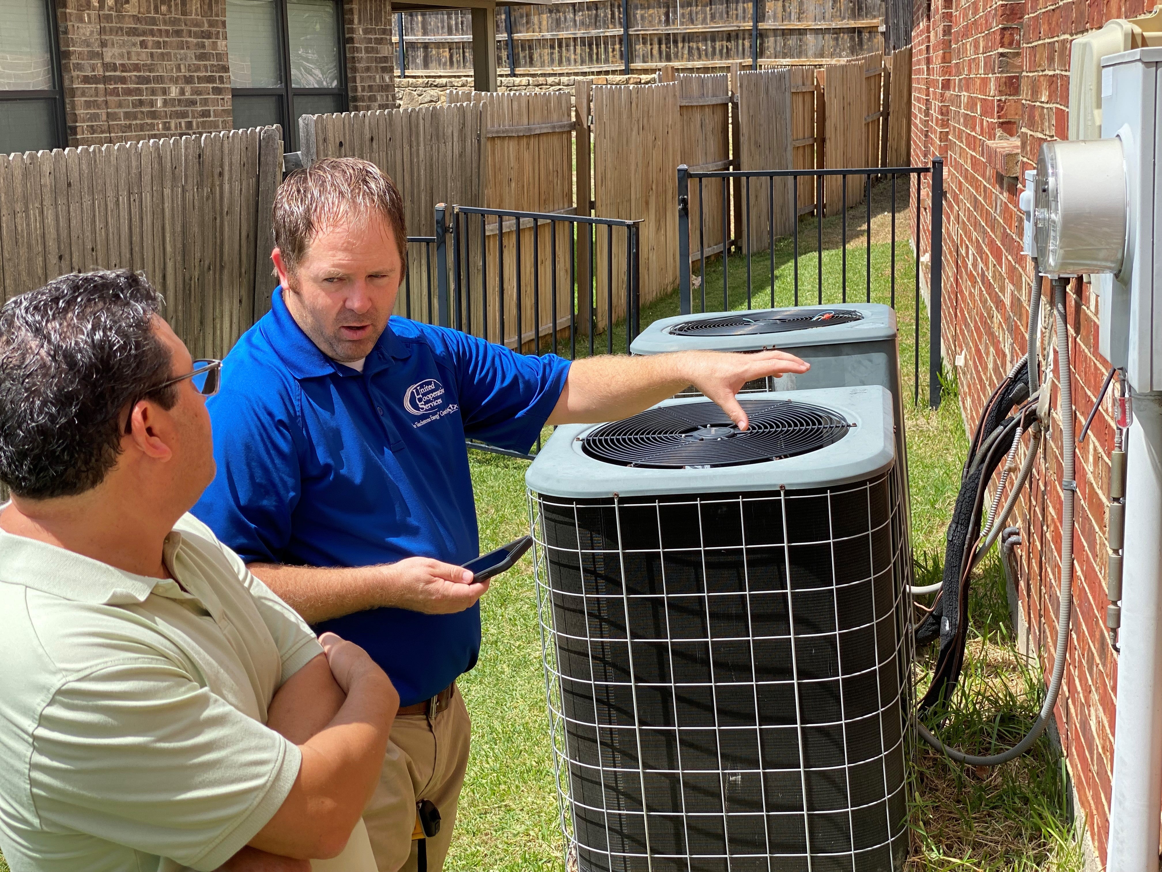 Energy Audit outside a members home