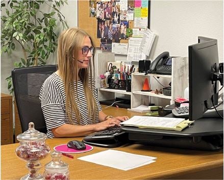 Carly typing on the computer