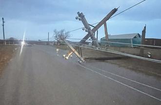 Image of storm damaged utility pole