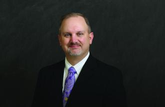 Image of United Director Chris Magee