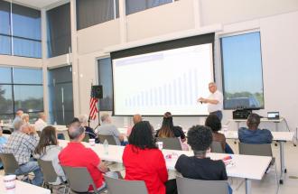 Image of CEO giving presenation