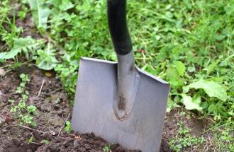 Image of shovel in ground